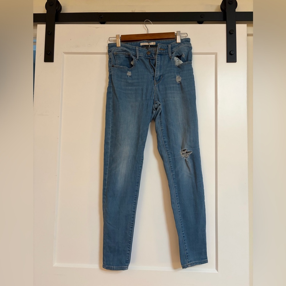 Women’s Levi's Light Blue Distressed 721 Skinny Jeans